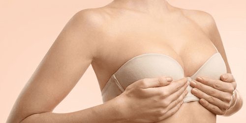 Breast lift with implants